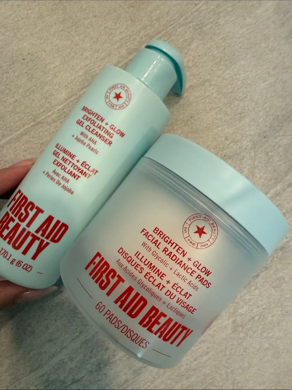First Aid Beauty Brighten + Glow Set exfoliating gel cleanser & facial pads 2 pc